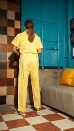 Load image into Gallery viewer, Front Zip Lapel Tapered Jumpsuit — Yellow Floral
