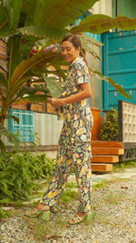 Load image into Gallery viewer, Short Sleeve Tapered Jumpsuit — Pineapple Print
